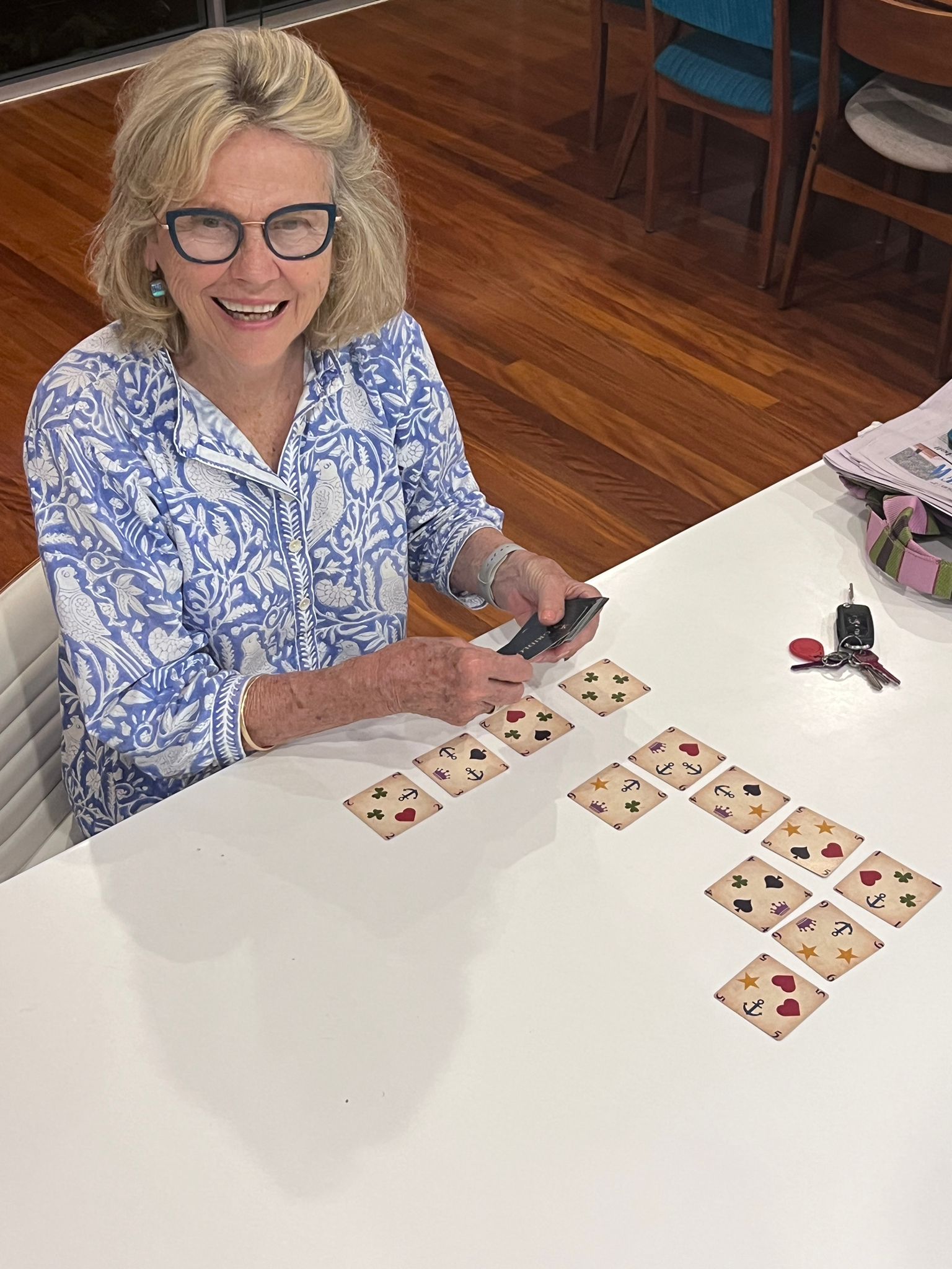 Woman enjoying playing Gridmatch by herself